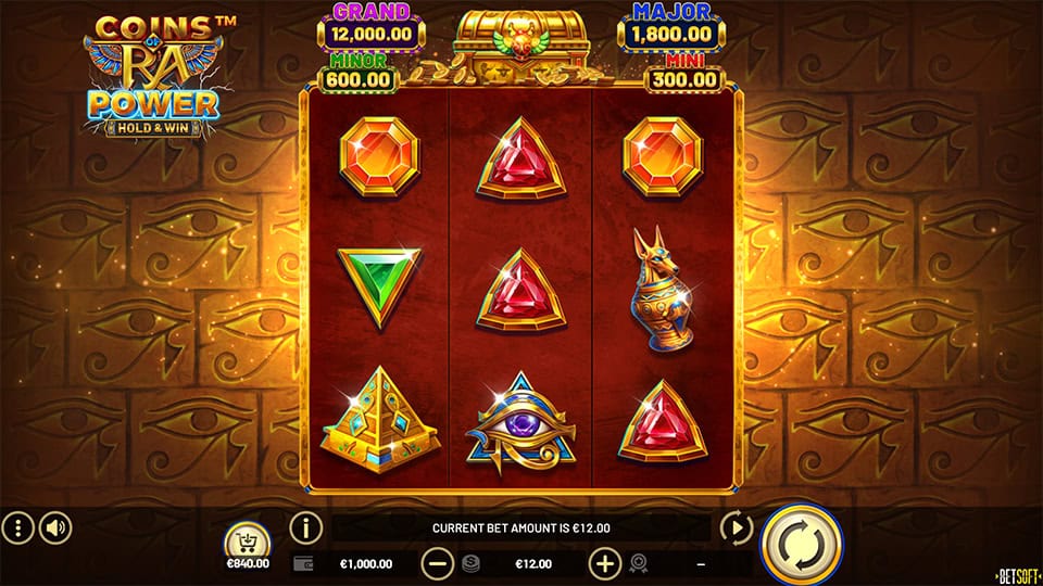 Base game screen of Coins of Ra Power with Egyptian-themed gems and golden symbols.