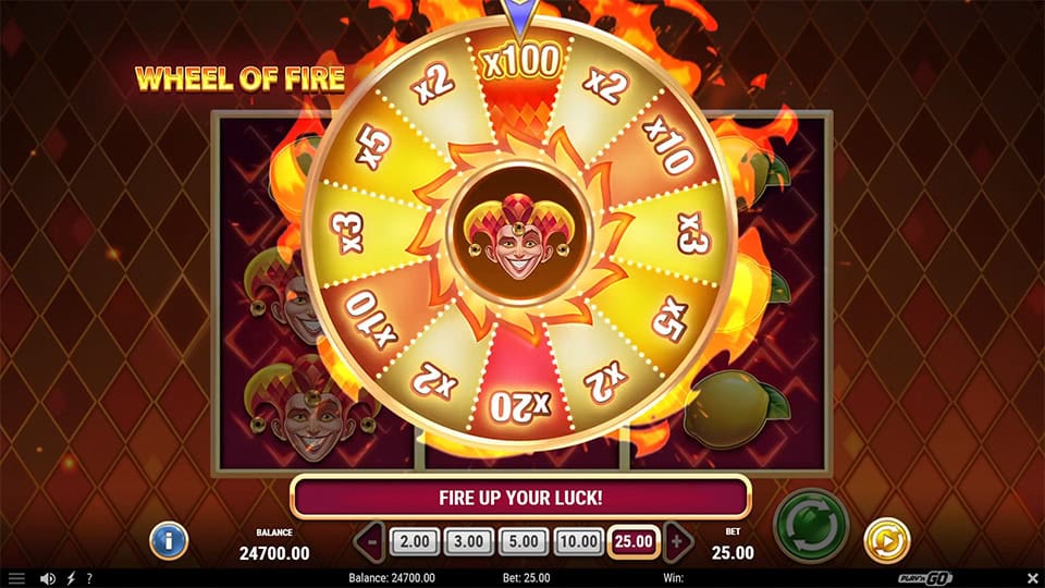 Bonus wheel from Fire Joker 100 with fiery segments offering multipliers up to x100, centered around the joker's face.