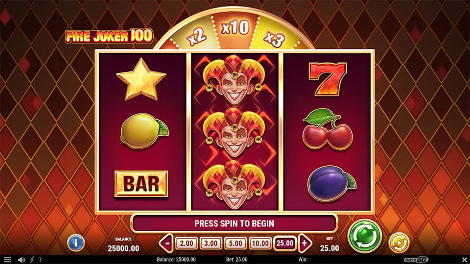 Main screen of Fire Joker 100 slot showing three reels with classic symbols like stars, lemons, BAR and the joker on a fiery backdrop.