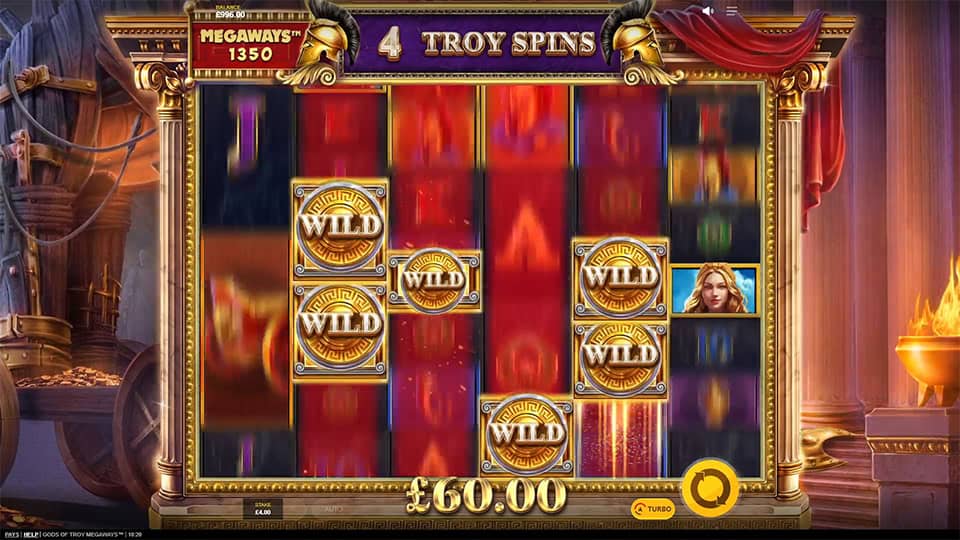 Gods of Troy Megaways slot during Free Spins with stacked golden Wilds appearing on multiple reels.