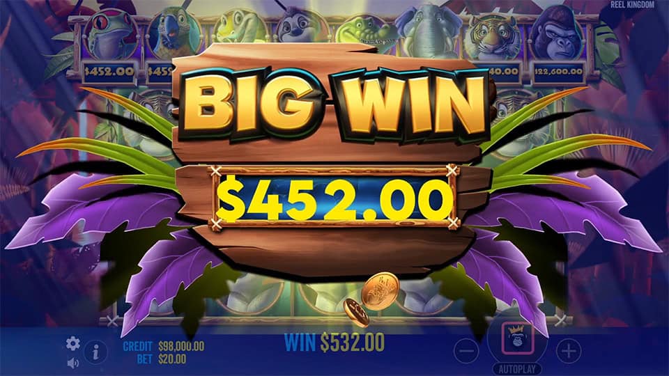 Big Win animation in Jumbo Safari showing a wooden signboard displaying a $452.00 win surrounded by jungle leaves and falling coins.