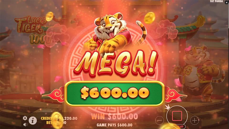 Mega win animation in Lucky Tiger 1000 showing $600.00 prize with gold coins flying and the tiger character celebrating.
