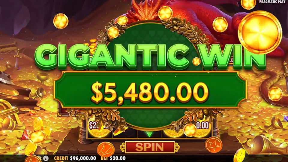 Gigantic win animation in Sleeping Dragon showing $5,480.00 in gold text with coins flying around a glowing win board.
