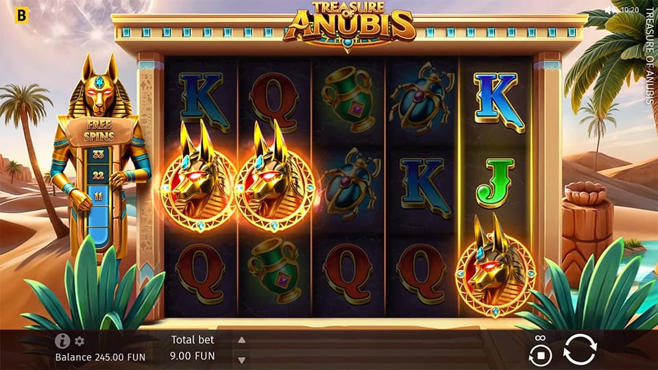 Treasure of Anubis slot showing three Anubis scatter symbols triggering the Free Spins feature.