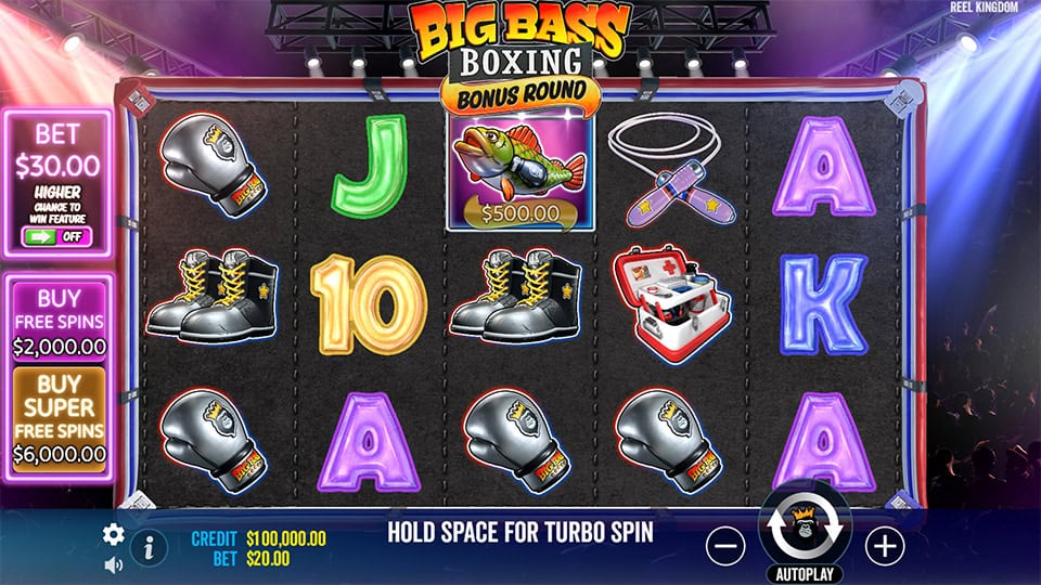 Base game screen featuring boxing-themed symbols like gloves, boots and the Big Bass fish on a dark canvas-style background.