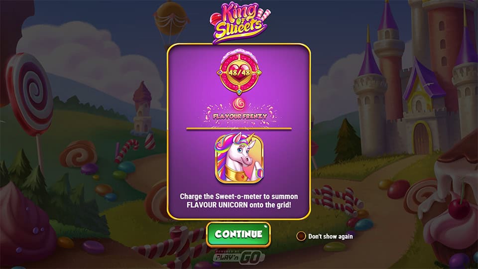 Intro screen of King of Sweets with a castle, candy-filled meadows and a 48/48 Sweet-o-meter ready to trigger Flavour Frenzy.