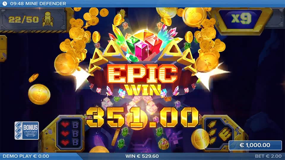 Mine Defender slot celebrating a 351.00 win with coins bursting and a red crystal at the center.