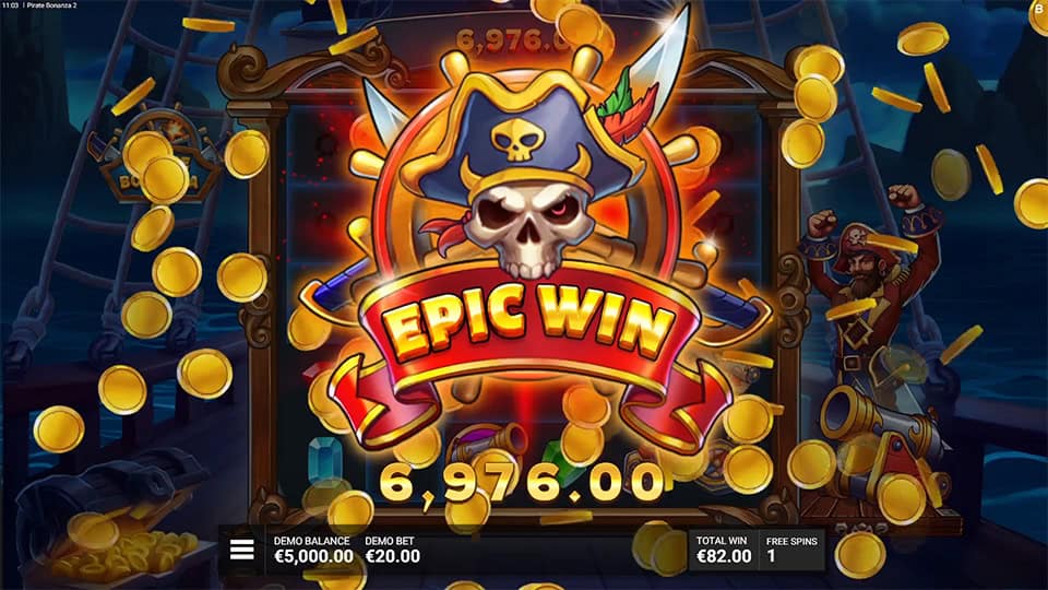 Epic Win banner with pirate skull emblem and flying gold coins lighting up the reels.