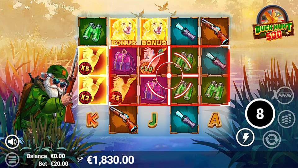 Hunter’s Shot feature in Duck Hunt 500 showing a red target overlay aiming at ducks on the reels, each marked with win multipliers like x3 and x5.