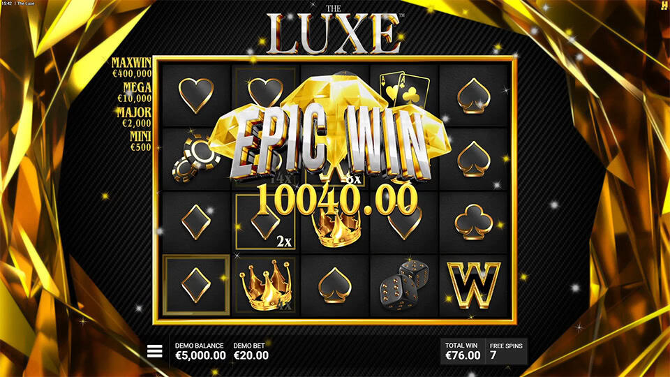 Epic Win message with diamonds and golden glow showing a big win and 5x multiplier.