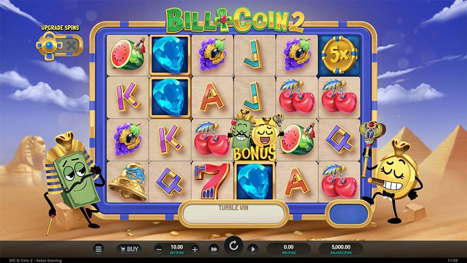 Main reels filled with colorful fruits, gems and symbols, with Bill and Coin characters standing on each side.