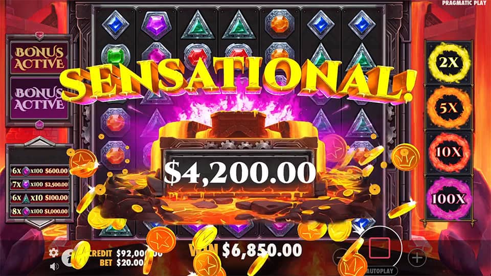 $4,200.00 Sensational Win animation with treasure chest, gold coins exploding and lava eruption.