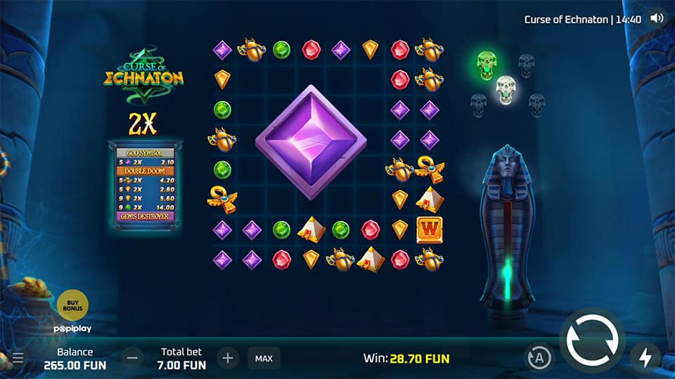 Huge purple gem symbol on a cleared grid during a win round with active x2 multiplier and visible paytable.