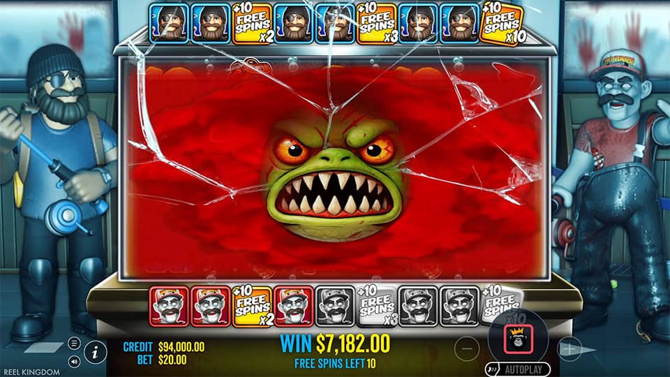 Gameplay showing a giant angry shark face smashing through the screen with blood-red water background, triggering a feature payout.