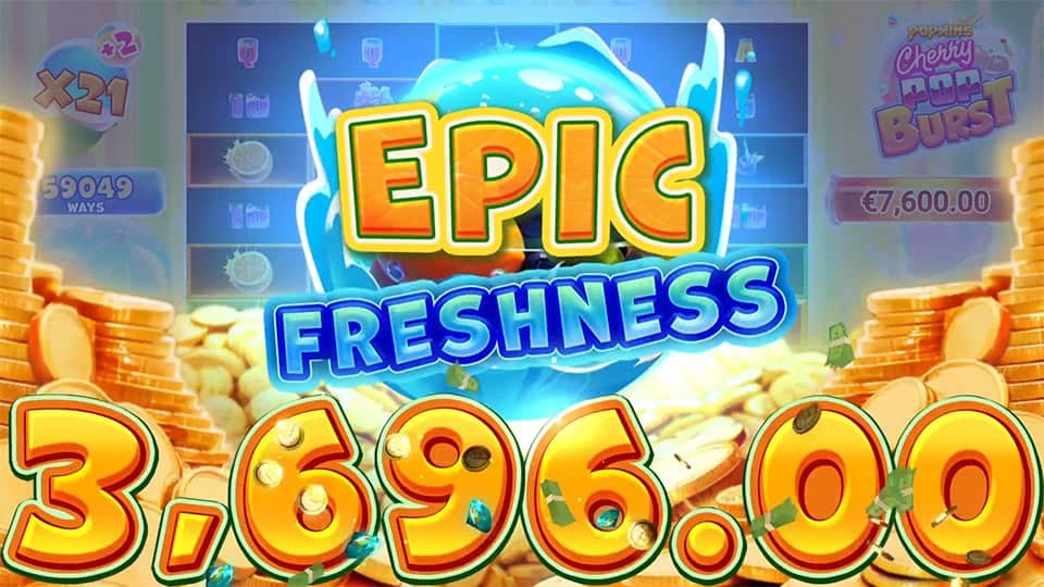 Epic Freshness win animation with coins, confetti and juice splash visuals in the background.