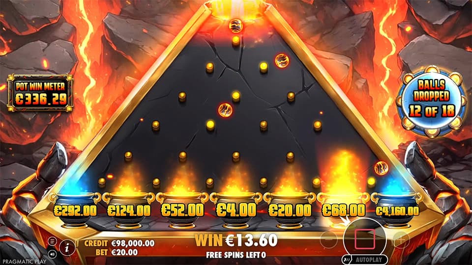 Lava Balls slot feature with fiery balls dropping into golden cauldrons across a molten background.