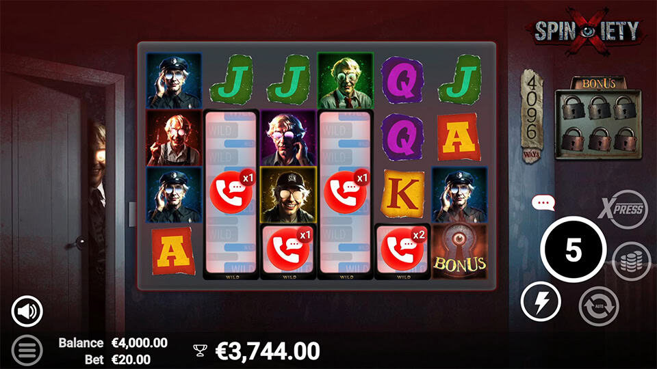 Gameplay with expanding wild reel symbols moving across the grid alongside creepy character icons.